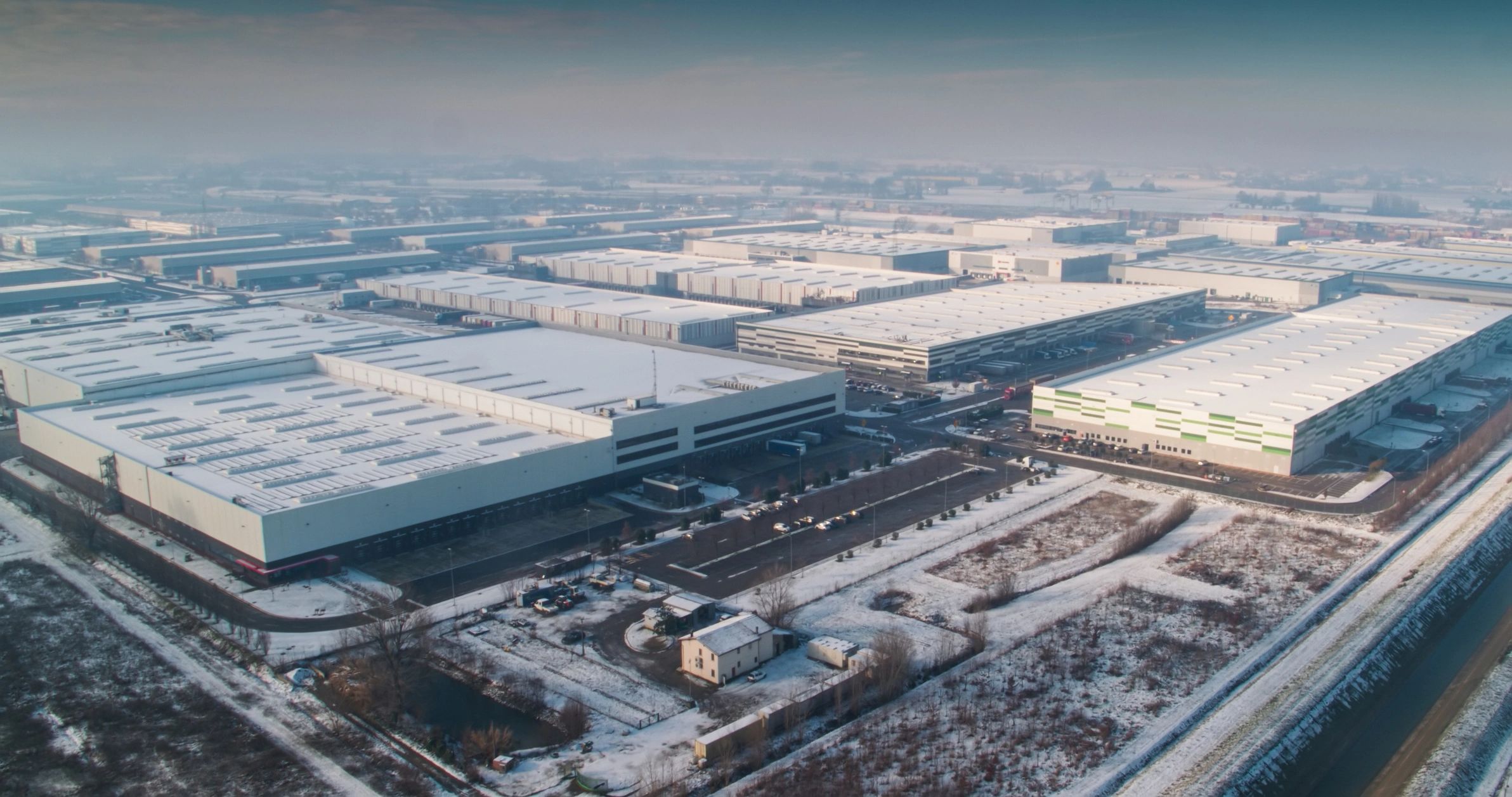 Wide aerial image showing large-scale industrial infrastructure